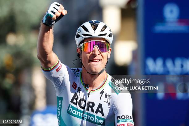 Team Bora-Hansgrohe rider Slovakia's Peter Sagan celebrates as he crosses the finish line to win the tenth stage of the Giro d'Italia 2021 cycling...