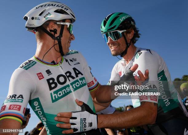 Team Bora-Hansgrohe rider Italy's Daniel Oss congratulates Team Bora-Hansgrohe rider Slovakia's Peter Sagan after Sagan won the tenth stage of the...