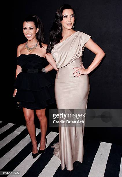 Personalities Kourtney Kardashian and Kim Kardashian attend A Night of Style & Glamour to welcome newlyweds Kim Kardashian and Kris Humphries at...