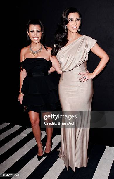 Personalities Kourtney Kardashian and Kim Kardashian attend A Night of Style & Glamour to welcome newlyweds Kim Kardashian and Kris Humphries at...