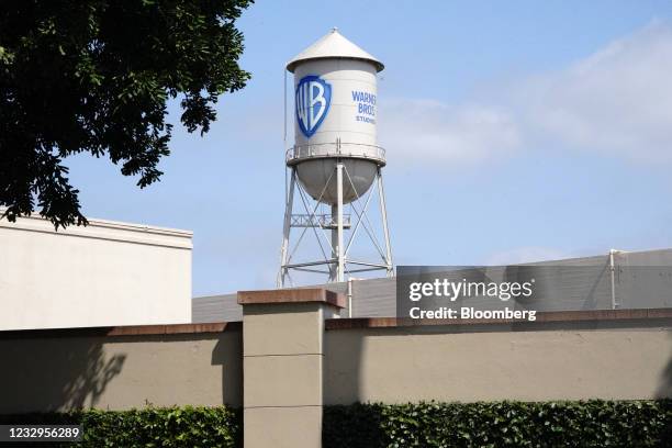 Signage on a water tower at Warner Bros. Studios in Burbank, California, U.S., on Monday, May 17, 2021. AT&T Inc. Agreed to spin off its media...