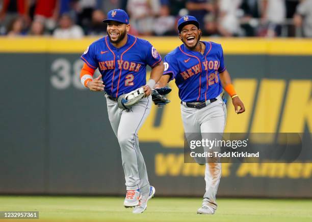 Khalil Lee and Dominic Smith of the New York Mets celebrate their win after an MLB game against the Atlanta Braves at Truist Park on May 17, 2021 in...