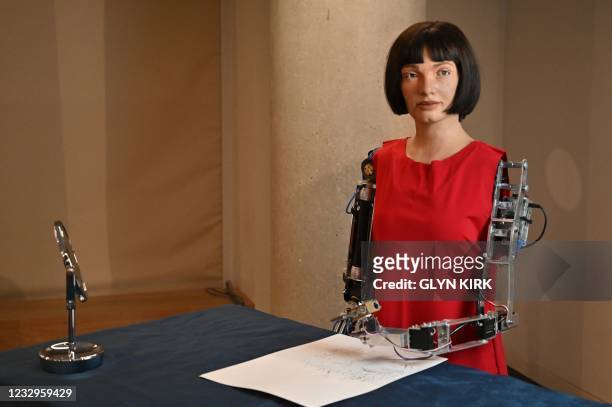 The worlds first ultra-realistic AI robot artist, Ai-Da, who can draw, paint and is a performance artist, is pictured during a press preview of the...