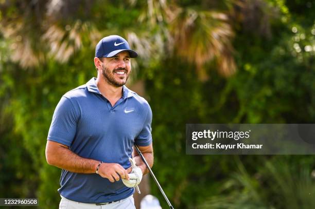 Brooks Koepka smiles during practice for the PGA Championship on The Ocean Course at Kiawah Island Golf Resort on May 17 in Kiawah Island, South...