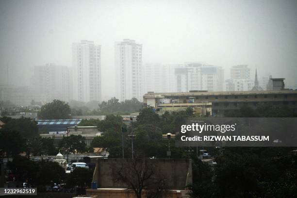 General view shows Pakistan's port city of Karachi on May 18, 2021 during a sand storm.