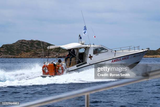 An ambulance boat carrying medical supplies for members of the Aegean Team, a Greek NGO which provides free health services to remote Greek Islands,...