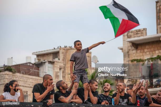 Palestinian citizens of Israel demonstrate in Haifa, Israel on 18 May to mark a nationwide general strike called by the country's Arab leadership and...