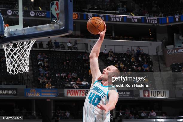 Cody Zeller of the Charlotte Hornets dunks the ball against the Indiana Pacers during the 2021 Play-In Tournament on May 18, 2021 at Bankers Life...