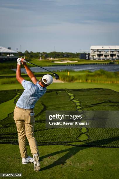 Cameron Champ hits a 3-hybrid shot into the water from the back tee on the 17th hole during practice for the PGA Championship on The Ocean Course at...