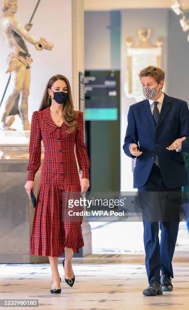 Catherine, Duchess of Cambridge walks with Tristram Hunt, Director, V&A Museum during her visit at The V&A on May 19, 2021 in London, England.