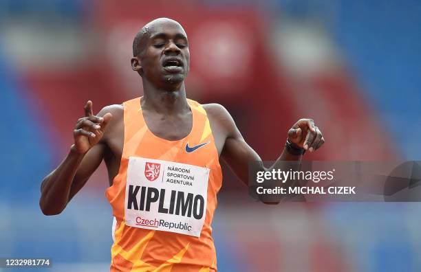 Jacob Kiplimo of Uganda reacts after crossing the finish line of the men's 10000m race during the IAAF Golden Spike 2021 Athletics meeting in...