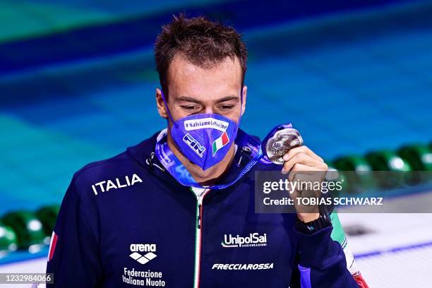 Italy's Gregorio Paltrinieri celebrates his silver medal on the podium of the Mens 1500m Freestyle Swimming event during the LEN European Aquatics...