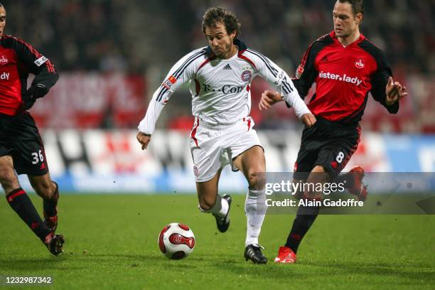 Mehmet SCHOLL of Bayern Munchen and Jan POLAK of Nuremberg during the Bundesliga match between Nuremberg and Bayern Munchen, at Max-Morlock-Stadion,...