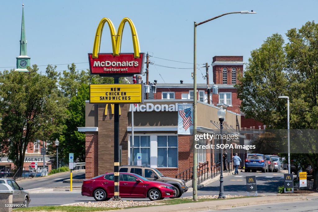 A McDonald's golden arches logo is seen at a franchise...