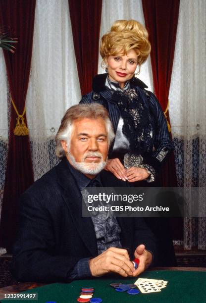 Pictured from left is Kenny Rogers and Loni Anderson in the television mini-series, GAMBLER V: PLAYING FOR KEEPS. Originally broadcast over two...