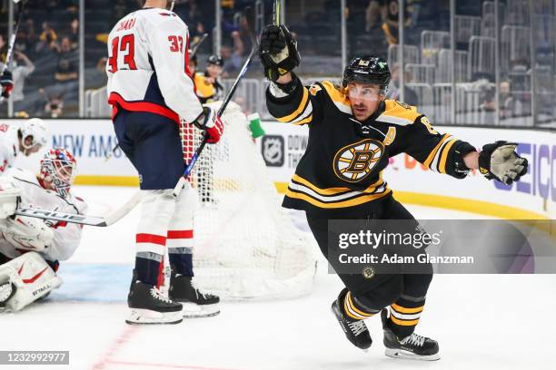 Brad Marchand of the Boston Bruins reacts after scoring in the third period against the Washington Capitals in Game Three of the First Round of the...