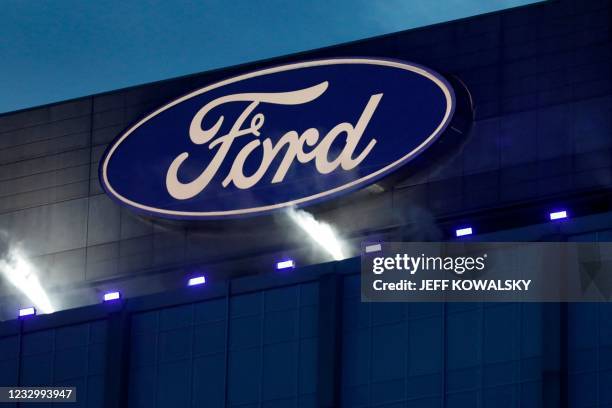 Ford Motor Company' logo is seen on the side of the building at the unveiling of their new electric F-150 Lightning outside of their headquarters in...