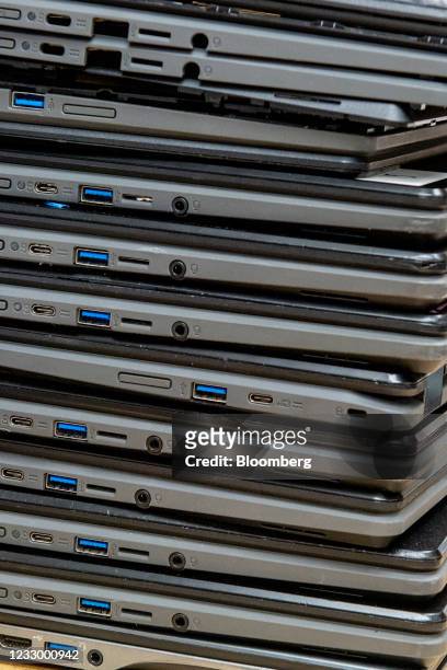 Stack of broken Chromebook laptops at Cell Mechanic Inc. Electronics repair shop in Westbury, New York, U.S., on Wednesday, May 19, 2021. For years,...