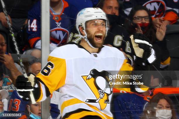 Jason Zucker of the Pittsburgh Penguins celebrates after scoring a goal against the New York Islanders during the second period in Game Three of the...