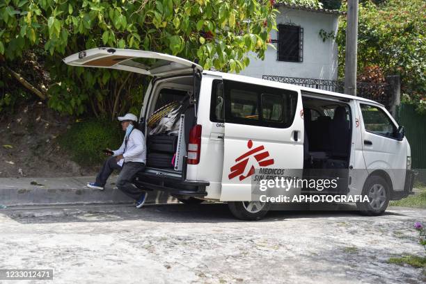 Volunteer sits on a Doctors Without Borders van on May 20, 2021 in San Salvador, El Salvador. Doctors Without Borders , mobilizes in the Salvadoran...