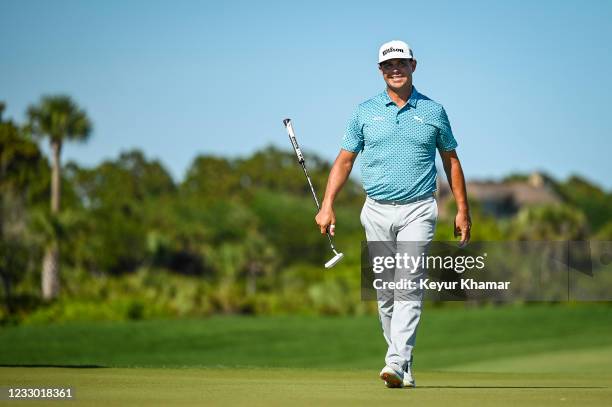 Gary Woodland reacts and smiles after missing a putt during the first round of the PGA Championship on The Ocean Course at Kiawah Island Golf Resort...