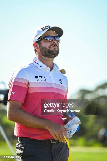 Corey Conners of Canada looks up on the 16th tee during the first round of the PGA Championship on The Ocean Course at Kiawah Island Golf Resort on...