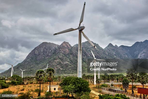 Wind turbines generate electricity in Kavalkinaru, Tamil Nadu, India.