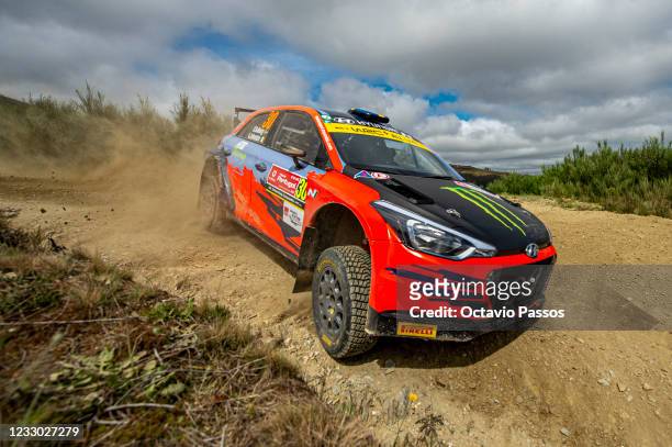 Oliver Solberg of Sweden and Aaron Johnston of Ireland compete in their Hyundai NG i20 during the SS3 Arganil of the FIA World Rally Championship...