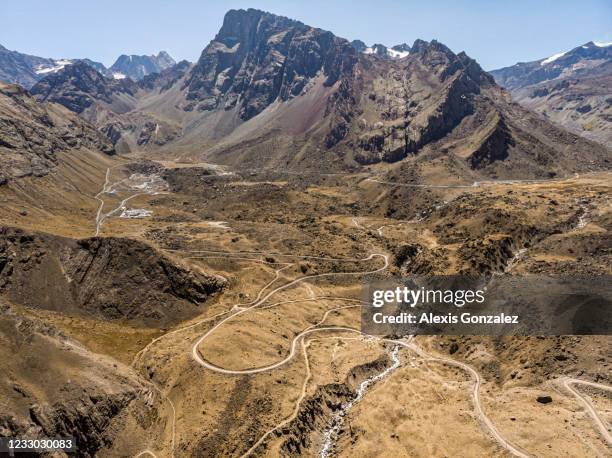 aerial view of a winding road in cajon del maipo - mai po nature reserve stock pictures, royalty-free photos & images