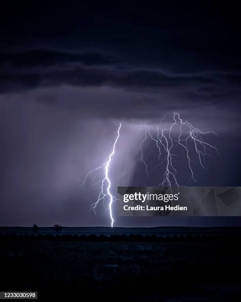 lightning on the great plains - dark country road stock pictures, royalty-free photos & images