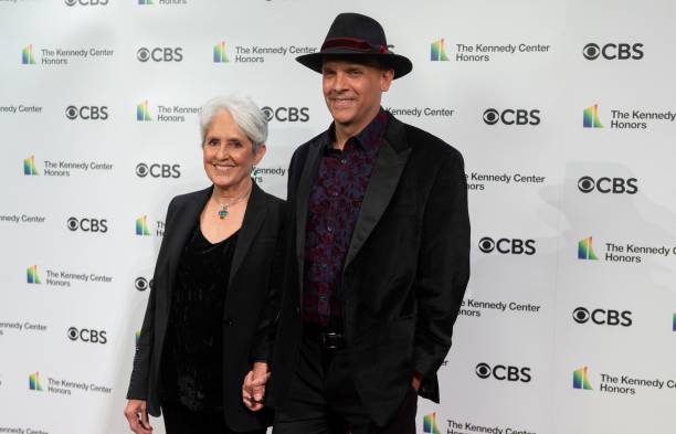 American singer, songwriter, musician, and activist Joan Baez and her son Gabriel Harris attends the 43rd Annual Kennedy Center Honors at The Kennedy...