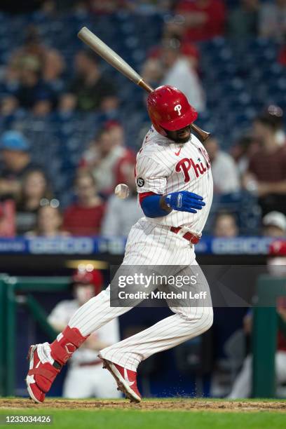 Odubel Herrera of the Philadelphia Phillies is hit by a pitch in the bottom of the fourth inning against the Boston Red Sox at Citizens Bank Park on...