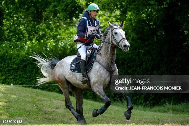 French's Nicolas Touzaint rides Diabolo Menthe, as he competes during the "Le Grand National du Lion d'Angers" - a preparatory event for the Tokyo...