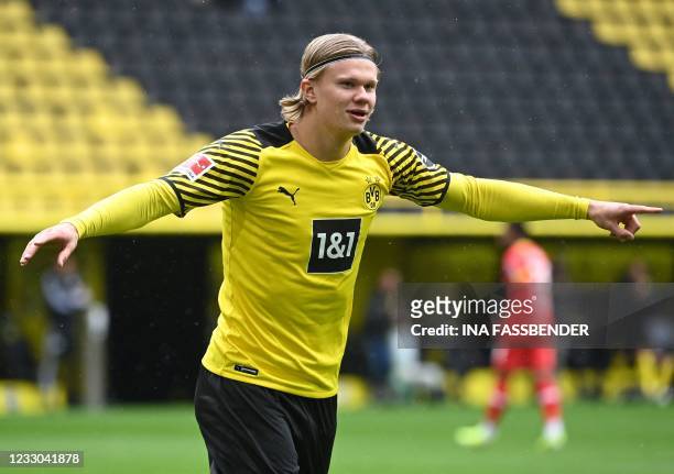 Dortmund's Norwegian forward Erling Braut Haaland celebrates the 1-0 during the German first division Bundesliga football match Borussia Dortmund vs...