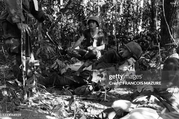 Wounded US soldiers are evacuated by helicopter after the battle of the 875-meter-high hill, on November 22, 1967 in Dak To during the Vietnamese war.