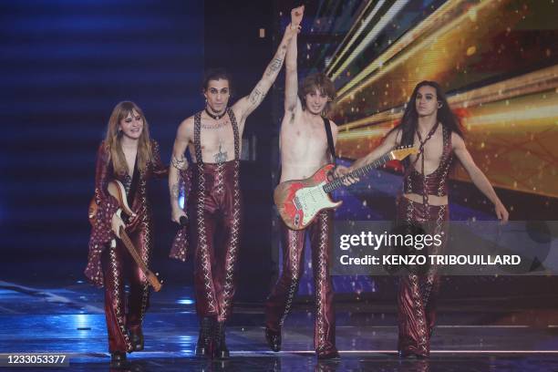 Italy's Maneskin celebrate on stage after winning the final of the 65th edition of the Eurovision Song Contest 2021, at the Ahoy convention centre in...