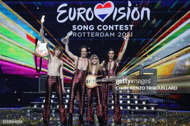 Italy's Maneskin pose for pictures on stage with the trophy after winning the final of the 65th edition of the Eurovision Song Contest 2021, at the...