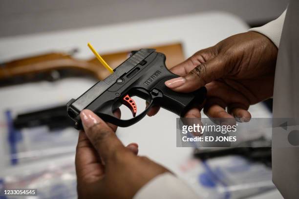 Ruger pistol, or handgun, is displayed during a gun 'buyback' event held by the New York Police Department and the office of the Attorney General, in...