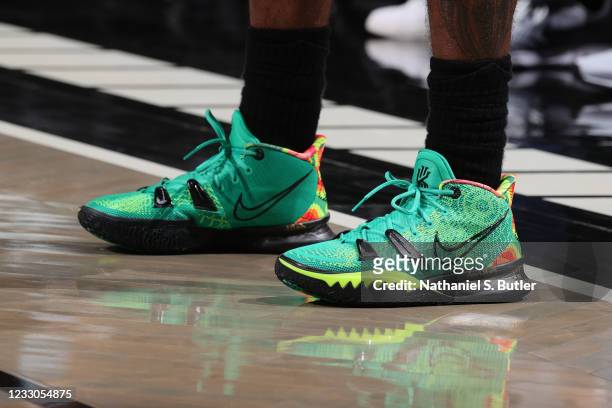The sneakers worn by Kyrie Irving of the Brooklyn against the... - Getty Images