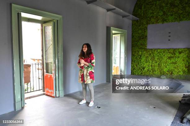 Elena Militello, President of the South Working Association, poses during an interview with AFP in one of the halls of the co-working space "Isola...