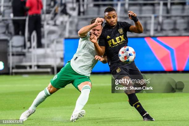 Diego Palacios of Los Angeles FC controls the ball against Keegan Rosenberry of Colorado Rapids during the match at Banc of California Stadium on May...