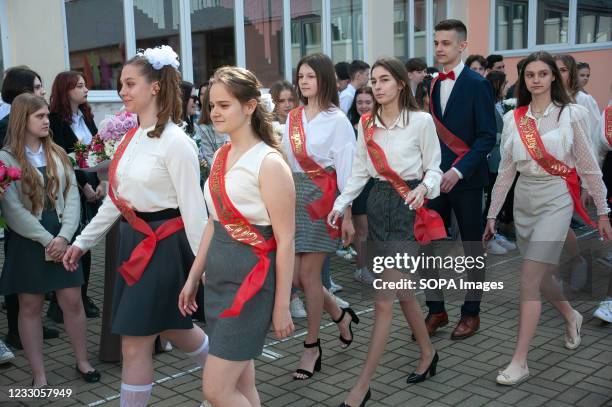 Graduates of the 11th grade of the 12th gymnasium of the city of Tambov coming for the festive school parade, during the event. Despite the...