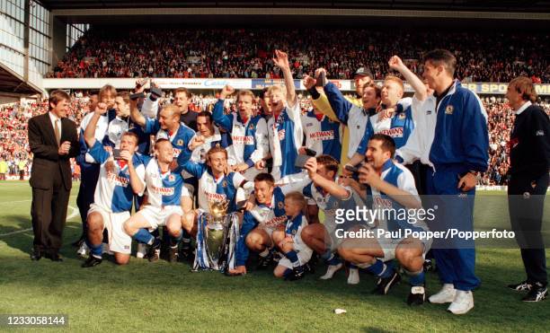 Blackburn Rovers line up for group photo as they celebrate with the trophy after winning the FA Carling Premiership title after the match against...