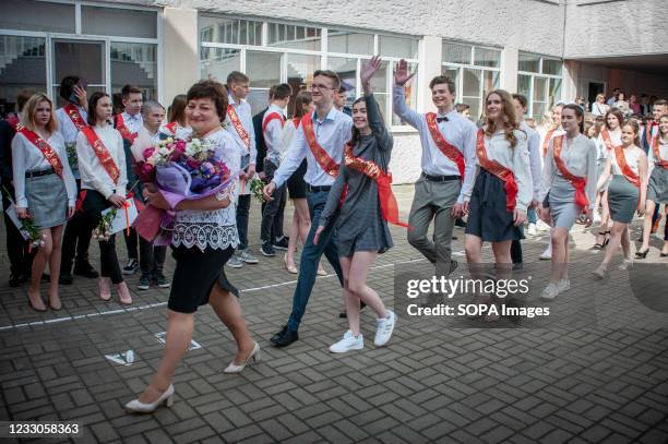Graduates of the 11th grade of the 12th gymnasium of the city of Tambov coming for the festive school parade, during the event. Despite the...
