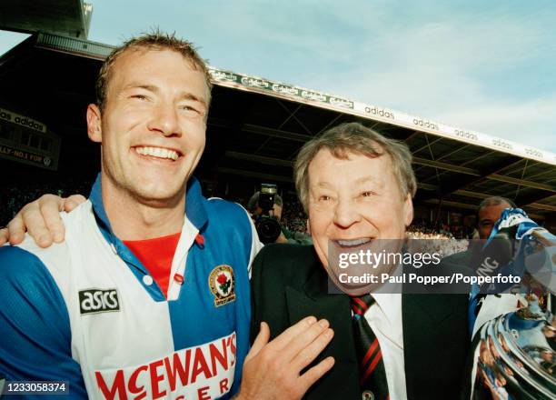 Blackburn Rovers owner Jack Walker and Alan Shearer celebrate with the trophy after winning the FA Carling Premiership title after the match against...