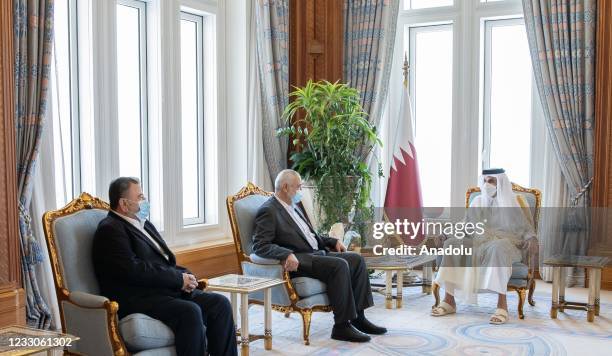 Qatari Emir Sheikh Tamim bin Hamad al-Thani meets Chairman of the Hamas Political Bureau Ismail Haniyeh , in Doha, Qatar on May 23, 2021.