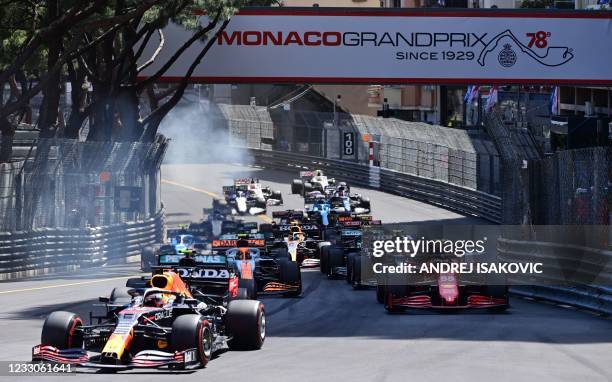 Red Bull's Dutch driver Max Verstappen , Ferrari's Spanish driver Carlos Sainz Jr and drivers compete during the Monaco Formula 1 Grand Prix at the...