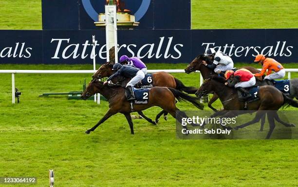 Kildare , Ireland - 23 May 2021; Empress Josephine with Seamie Heffernan up, passes the post ahead of second place Joan Of Arc with Ryan Moore up, to...