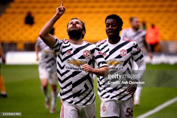 Juan Mata of Manchester United celebrates scoring a goal to make the score 1-2 during the Premier League match between Wolverhampton Wanderers and...