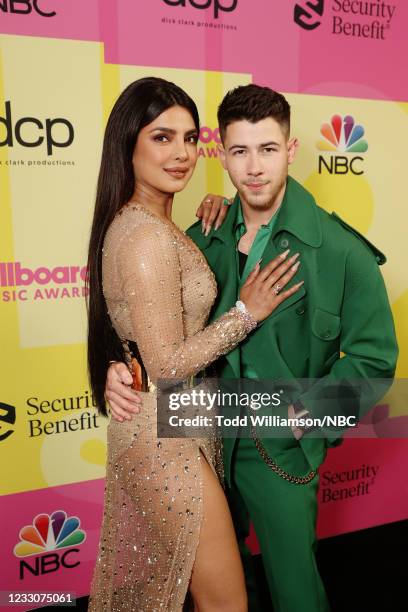 Pictured: Priyanka Chopra and Nick Jonas of Jonas Brothers arrive to the 2021 Billboard Music Awards held at the Microsoft Theater on May 23, 2021 in...